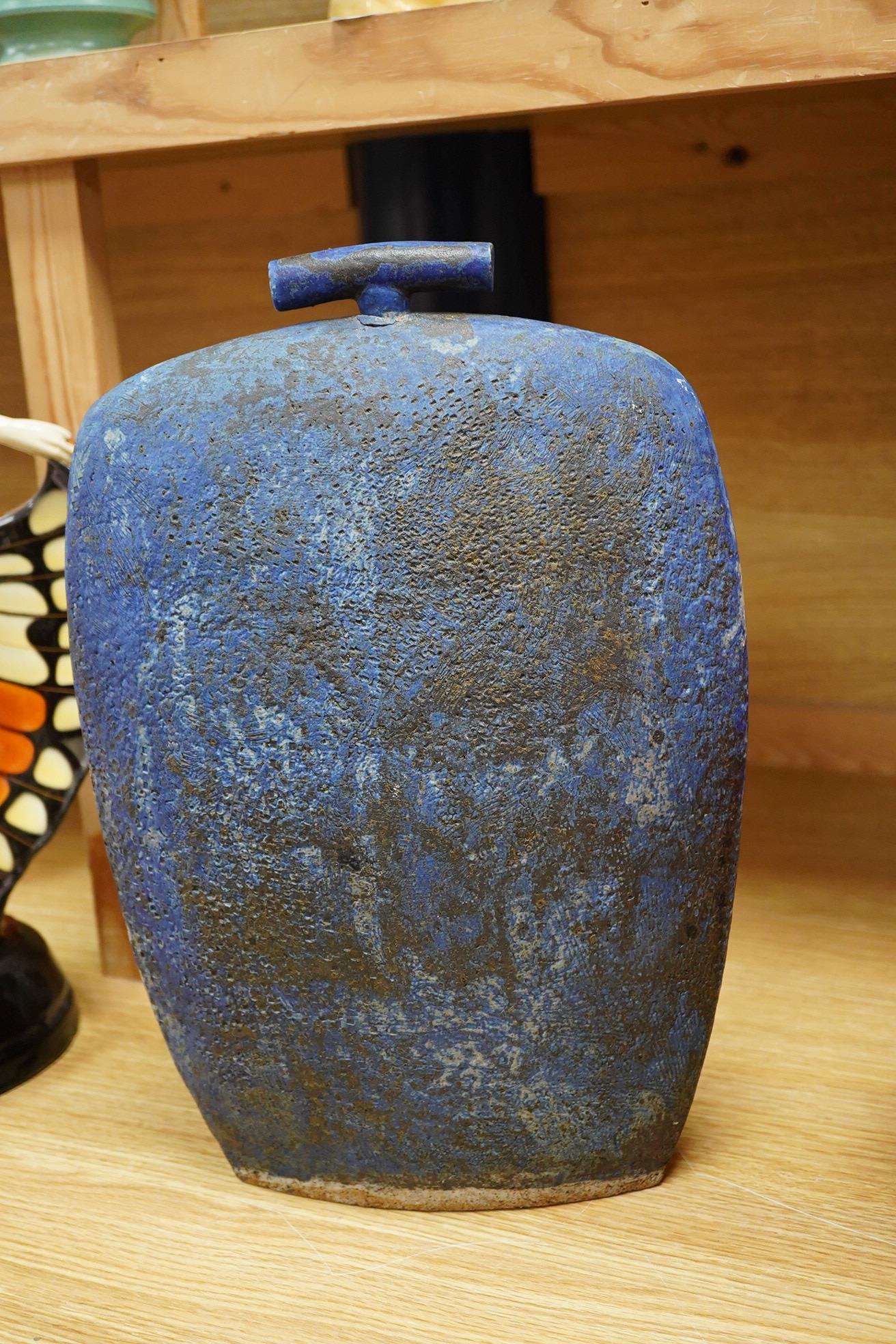 A large blue glazed pottery bottle and stopper, circa 1960's/80's, indistinct incised initials to the base, 37cm high
